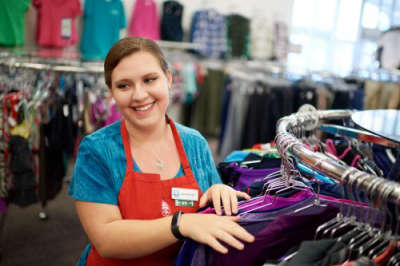 Retail worker smiling